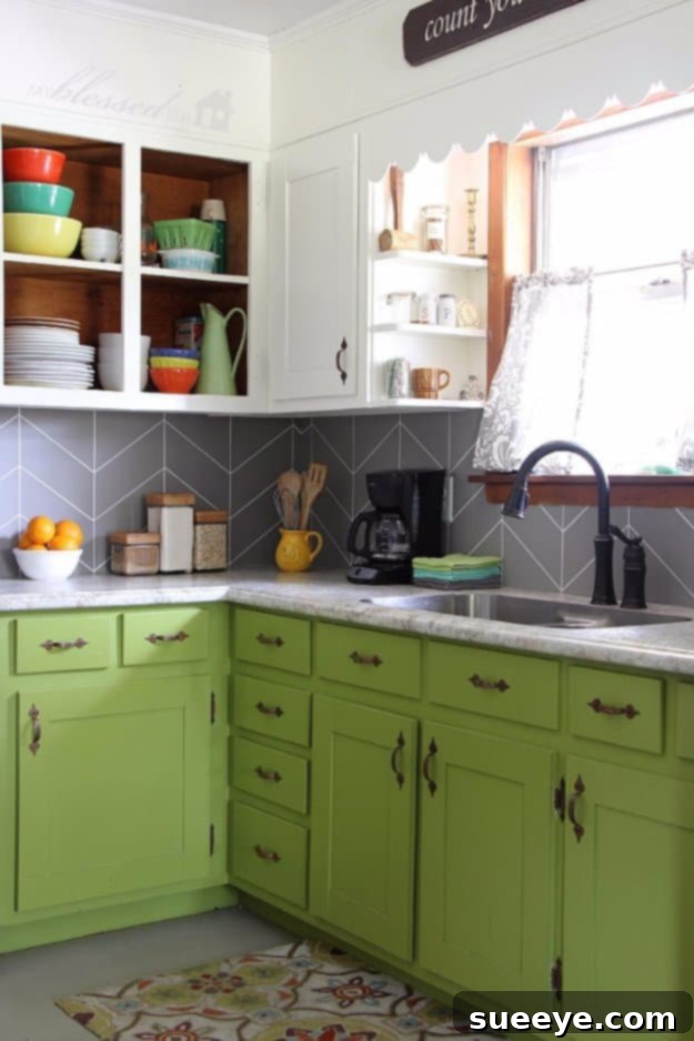 DIY Herringbone Tile Backsplash for Elegant Kitchen Renovations Stylish DIY herringbone pattern tile backsplash in a modern kitchen