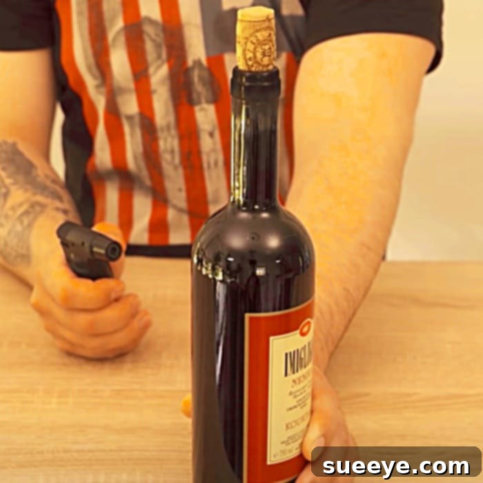 Unlock Your Wine No Corkscrew Required 3 The cork magically emerging from a wine bottle opened with a lighter.