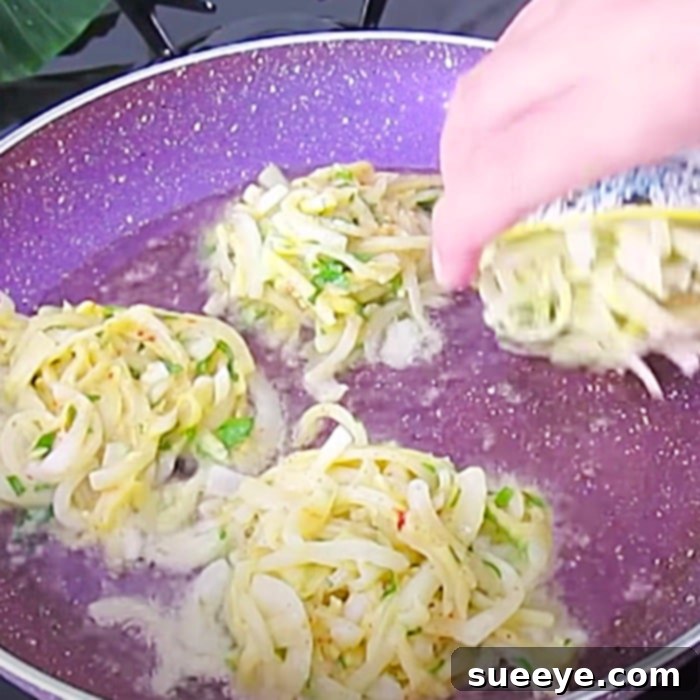 Crispy Onion Fritters 2 Delicious Homemade Onion Fritters: Easy Pan-Fried Recipe for Appetizers and Side Dishes