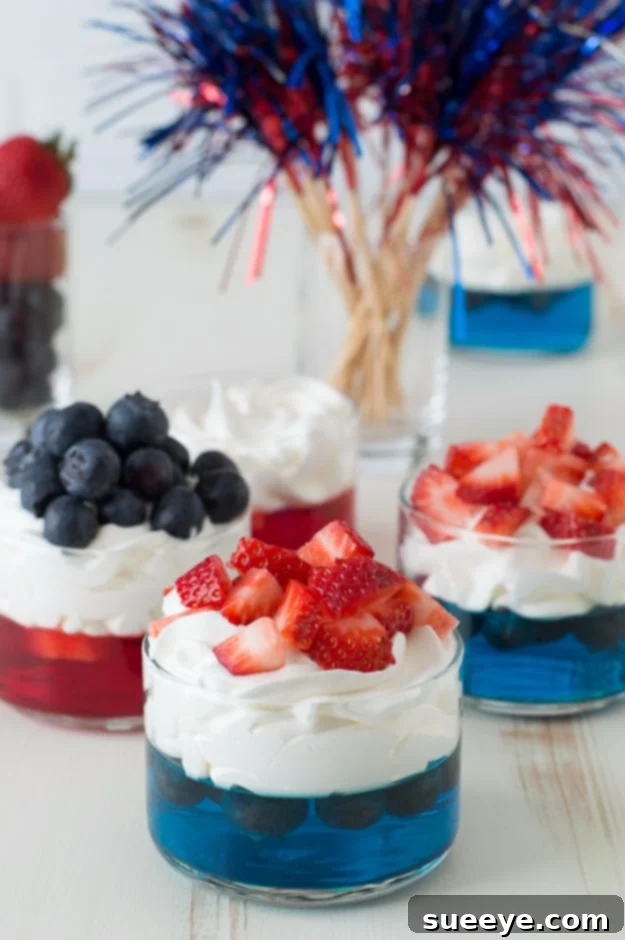 4th of July Fruit Jello Cups - Refreshing Layered Dessert 4th Of July Fruit Jello Cups - Fun Drink Ideas for Fourth of July parties