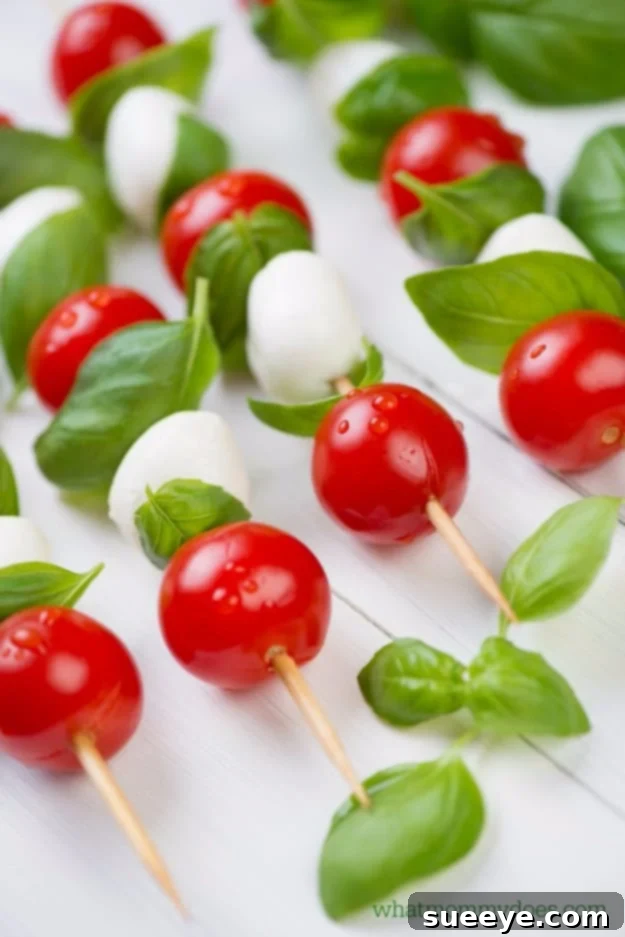 Fresh and Festive Caprese Kabobs for Fourth of July Caprese kabobs appetizer - Easy 4th of July party food idea