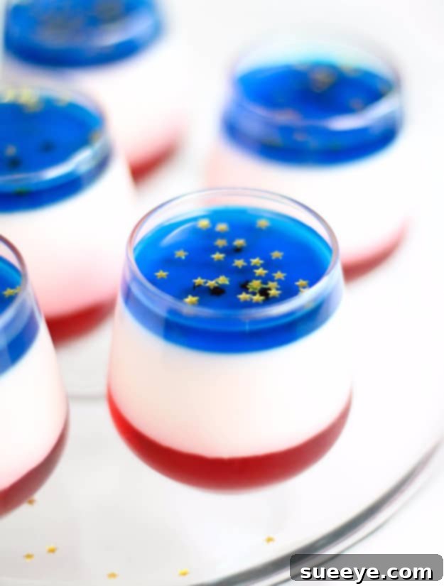 Patriotic Panna Cotta Shooters - Layered Red, White, Blue Patriotic Panna Cotta Shooters - Elegant 4th of July Dessert