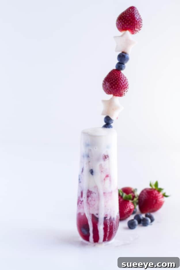 Firecracker Berry Margarita Floats - Boozy & Fun Firecracker Berry Margarita Floats - Festive 4th of July Drink