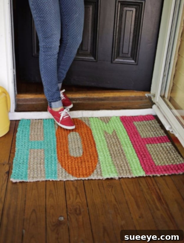 Colorfully Painted Mat Colorfully Painted Welcome Mat with abstract designs, adding a pop of color