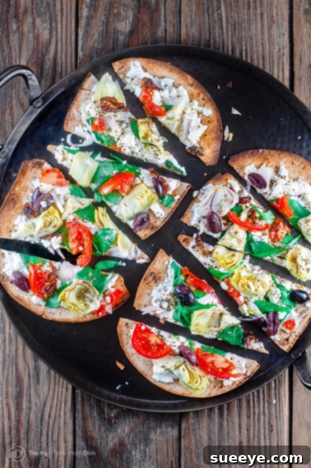 Fast Artichoke Garden Flatbread Pizza Recipe 15-Minute Artichoke Garden Flatbread Pizza with Fresh Herbs
