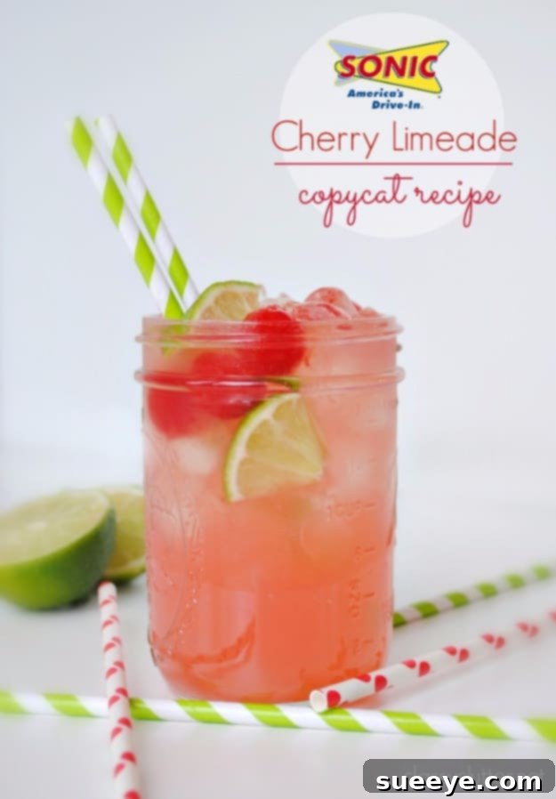 DIY Sonic Cherry Limeade: A Fun & Fruity Copycat Sonic Cherry Limeade Copycat Recipe in a glass with cherries and lime slices.