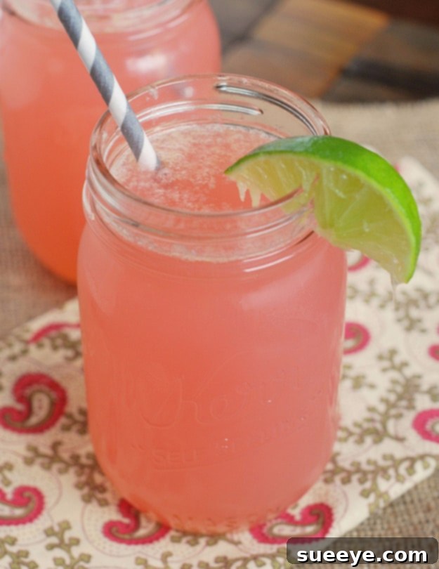 Fun & Fruity Cherry Beergaritas: A Unique Summer Drink Cherry Beergaritas in glasses, garnished with cherries and lime.