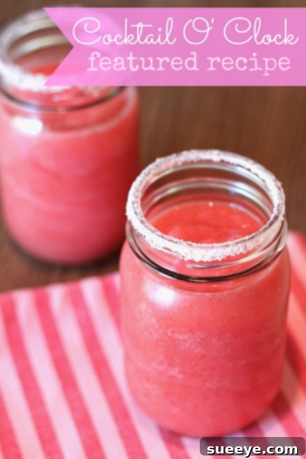 Tropical Strawberry Coconut Margarita: A Creamy Summer Dream Creamy Strawberry Coconut Margarita in a glass, garnished with a strawberry and coconut flakes.