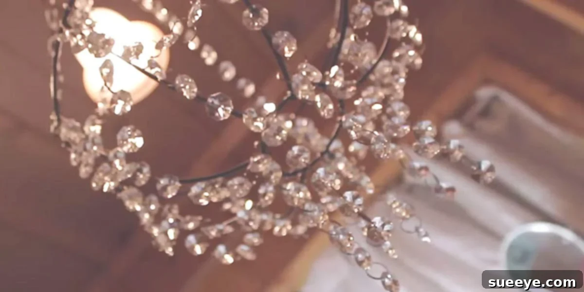 DIY beaded chandelier lighting project made from dollar store items
