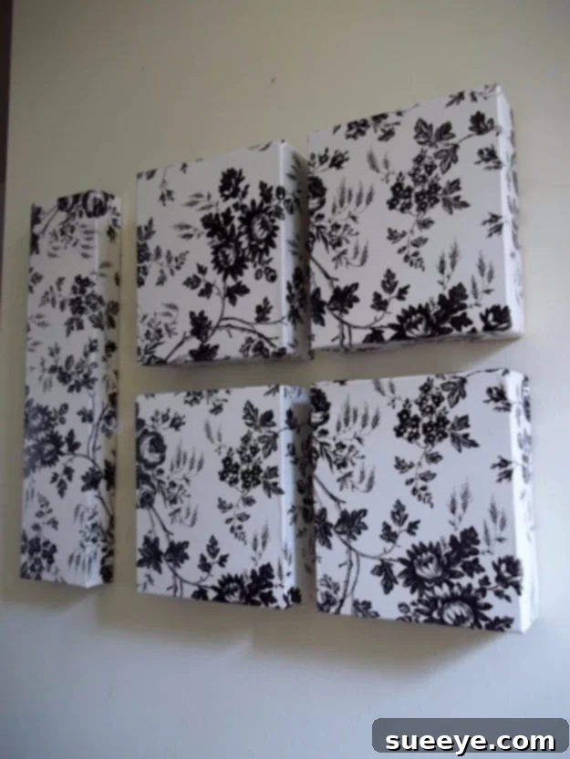 DIY wall art made with dollar store contact paper and recycled boxes