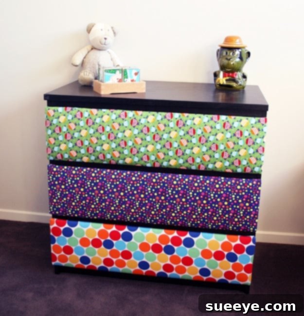 DIY upholstered drawers using fabric for a luxurious furniture update