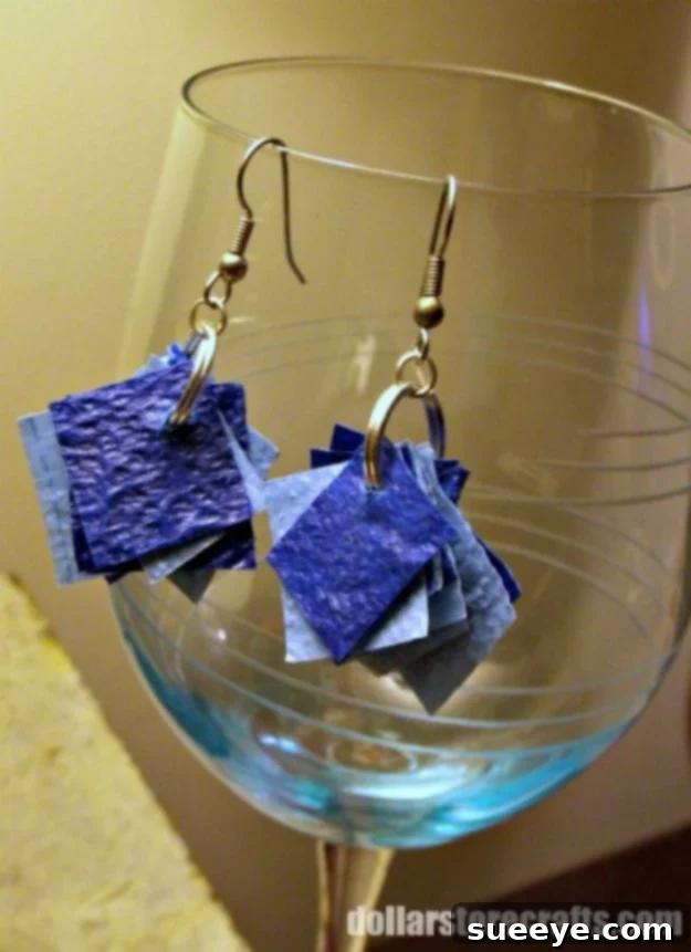 DIY festive plastic tablecloth confetti earrings for a party look