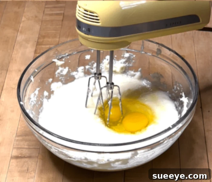 Ultimate Strawberry Cake Recipe 7 Creaming Butter and Sugar for Moist Strawberry Cake Batter