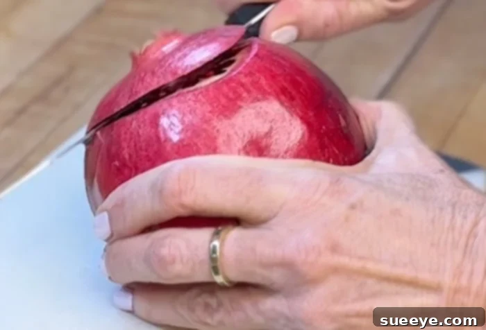 Pomegranate Peeling: The 60-Second Method 4 Cutting the crown of a pomegranate