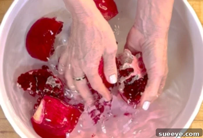 Pomegranate Peeling: The 60-Second Method 8 Pomegranate seeds separated in water