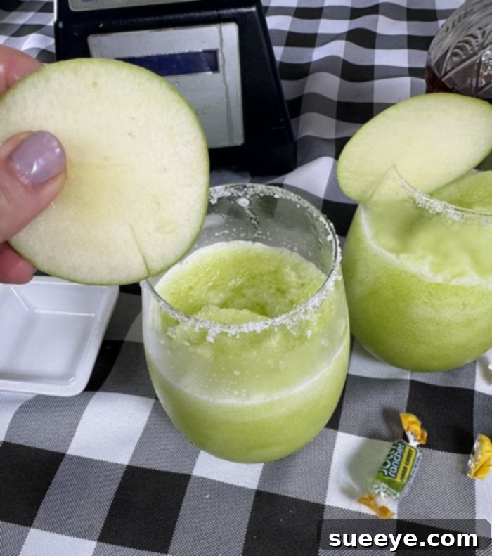 Rancher's Crown Royal Apple Slush 14 Slicing Granny Smith apples for cocktail garnish