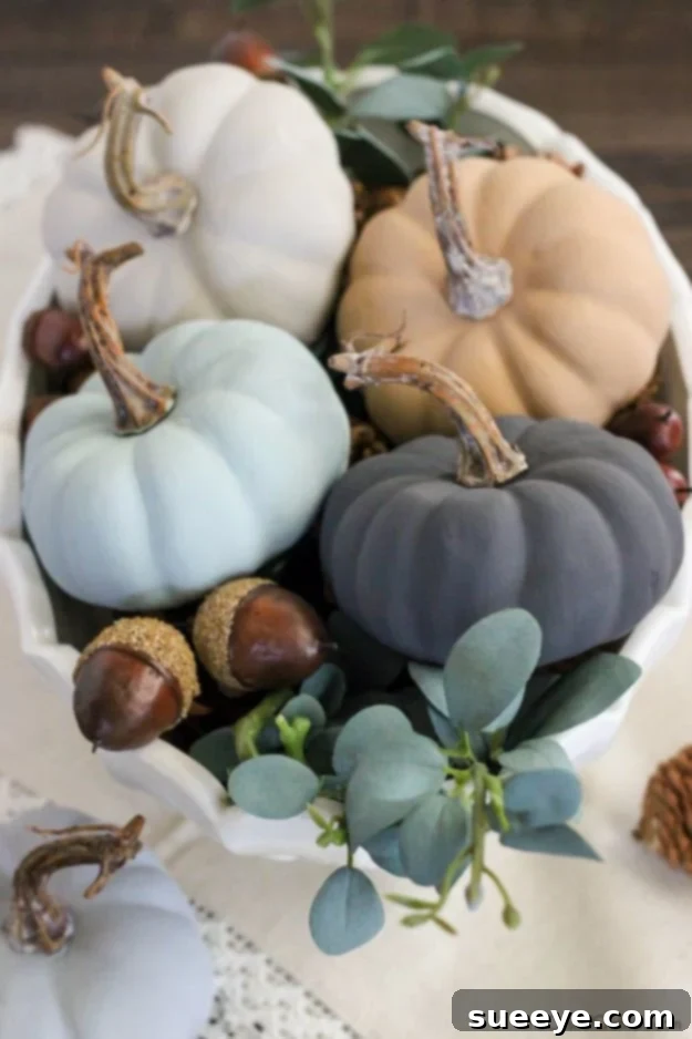 Pumpkins painted with chalky paint for a charming vintage-inspired fall look