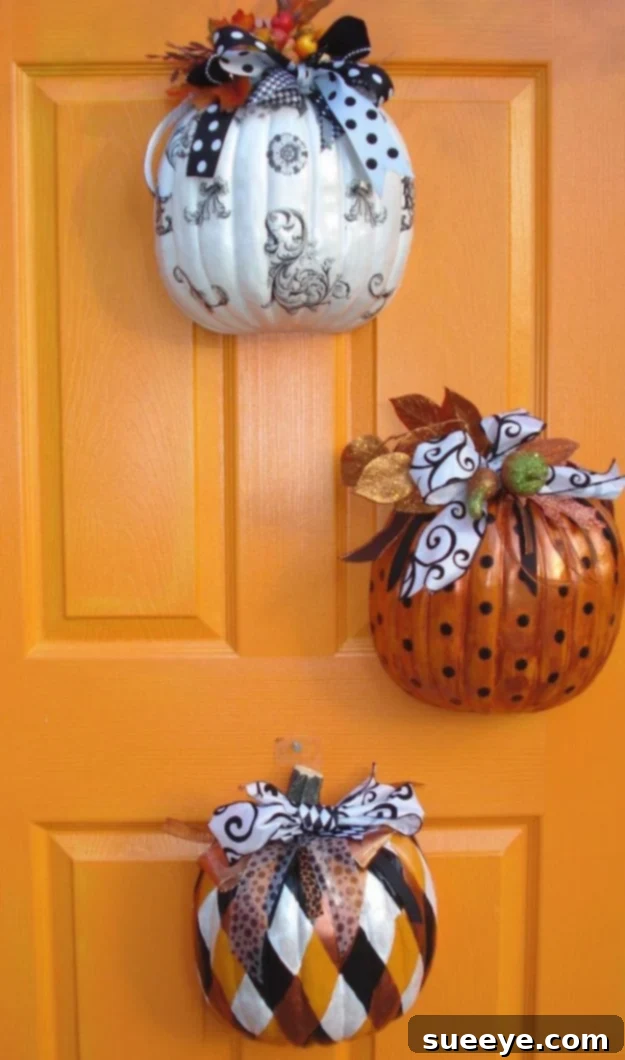 Charming pumpkin-shaped door hanger adorned with fall decorations