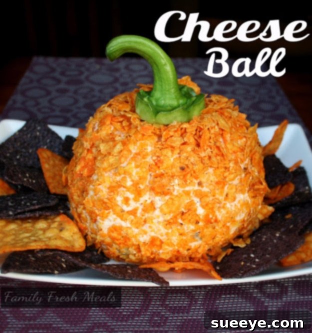 Perfect Fall Cheese Ball - Appetizer Idea Festive Perfect Fall Cheese Ball decorated with autumn colors, ideal for holiday entertaining.