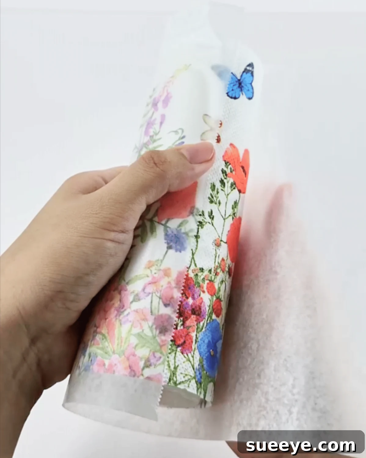 Effortless Napkin Paper Candle Making 4 Step-by-Step Candle Wrapping with Napkin Paper - Covering the design with wax paper before fusing