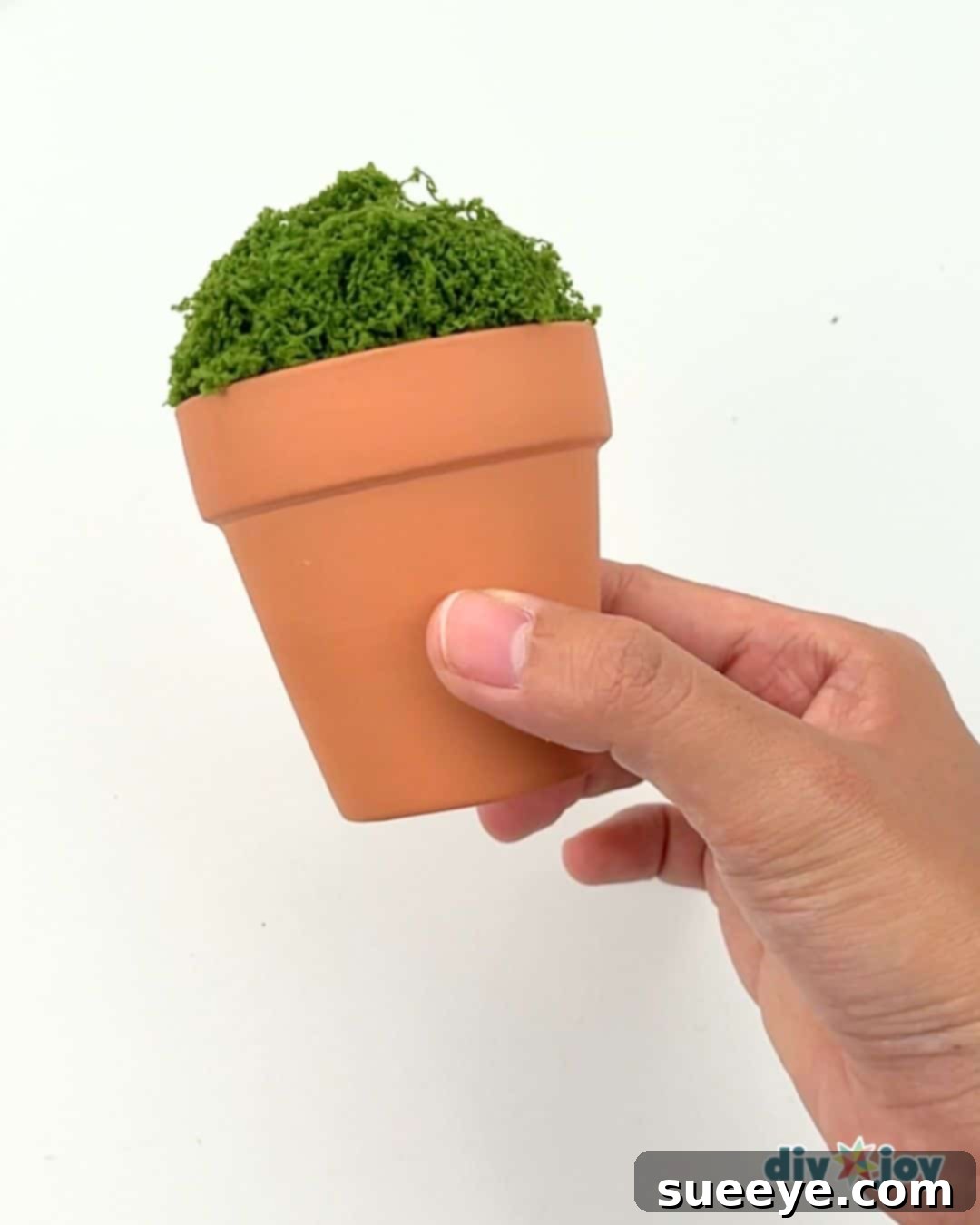 Crafting Exquisite Beaded Plants 3 Covering styrofoam with fake moss for a natural plant base