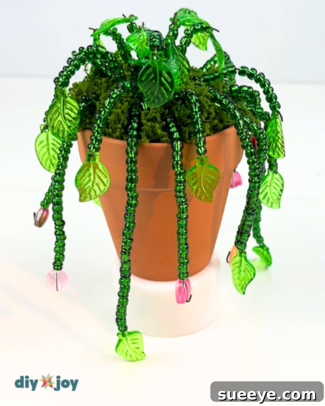 Crafting Exquisite Beaded Plants 10 Adding flower or fruit stems as the final step to the tiny desk plant