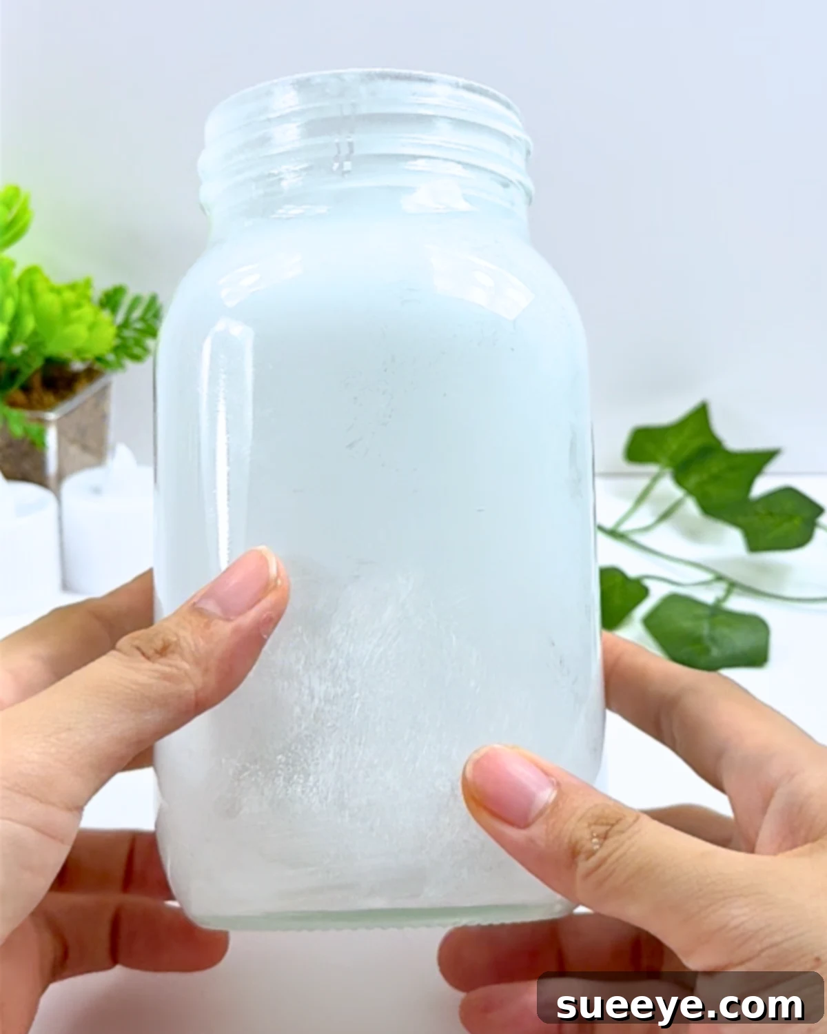 Magical DIY Fairy Lantern 3 Easy Fairy Jar Lamp - Demonstrates painting the inside of a glass jar with white acrylic paint.