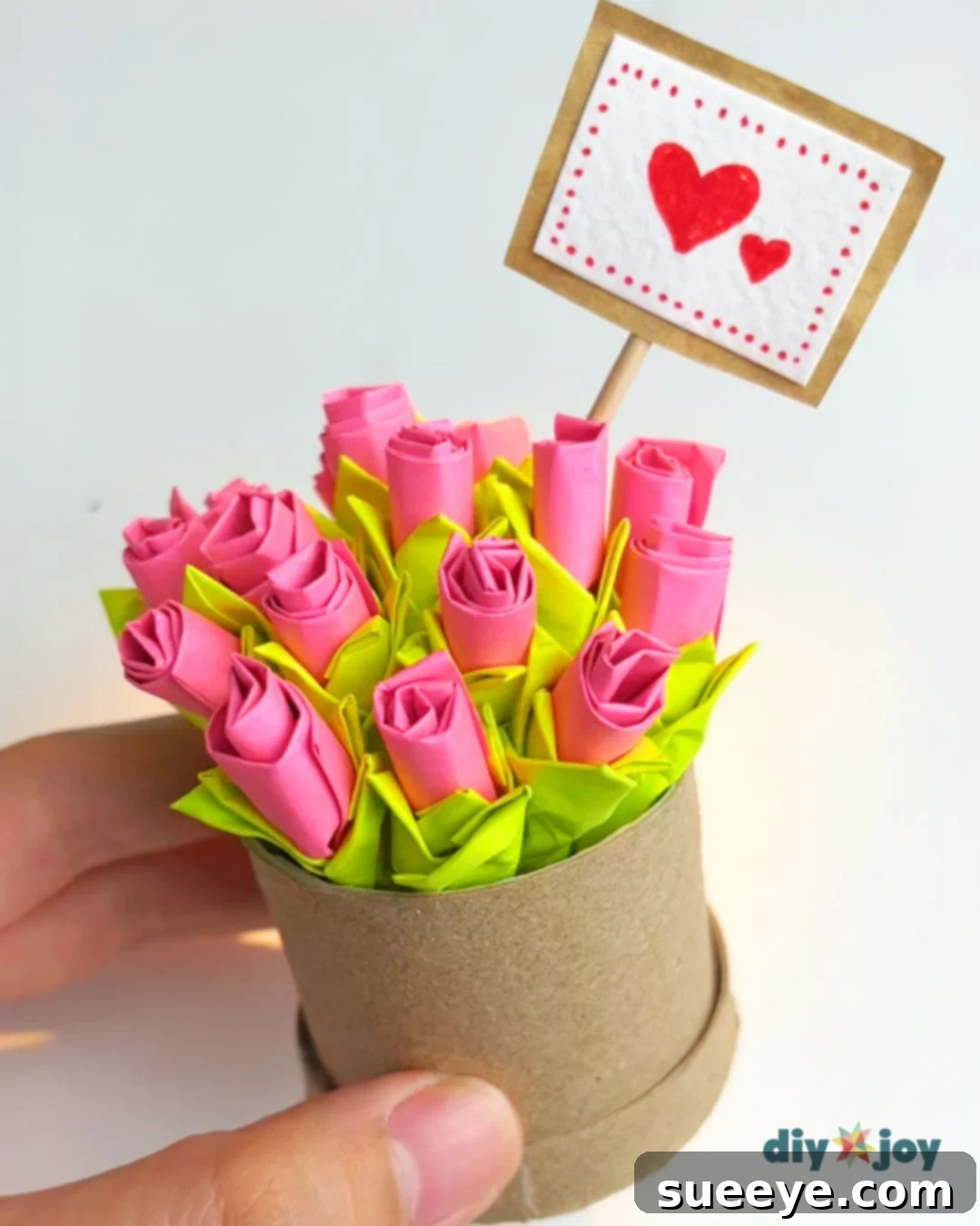 Ideas and examples for decorating and personalizing the Post-it note paper flower bouquet, including a heart sign