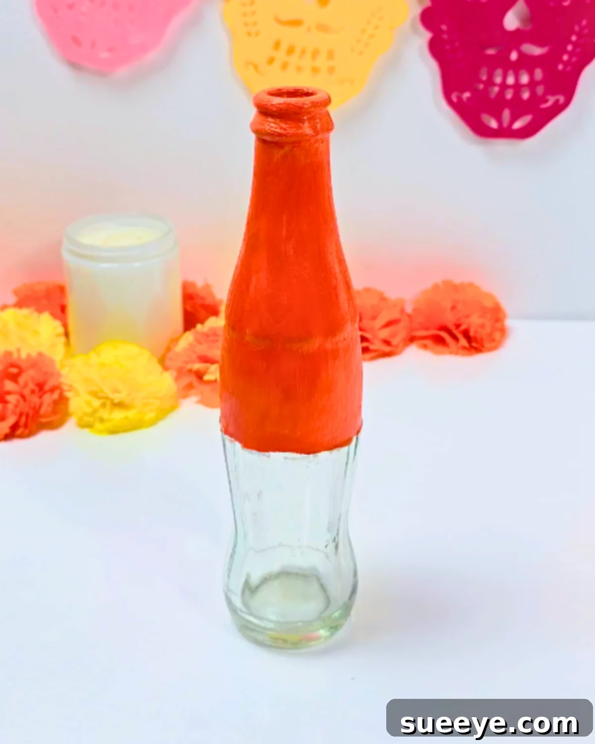 Craft a La Catrina from a Coca-Cola Bottle 2 How to Make La Catrina Using a Coca-Cola Bottle - Painting the base of the recycled bottle