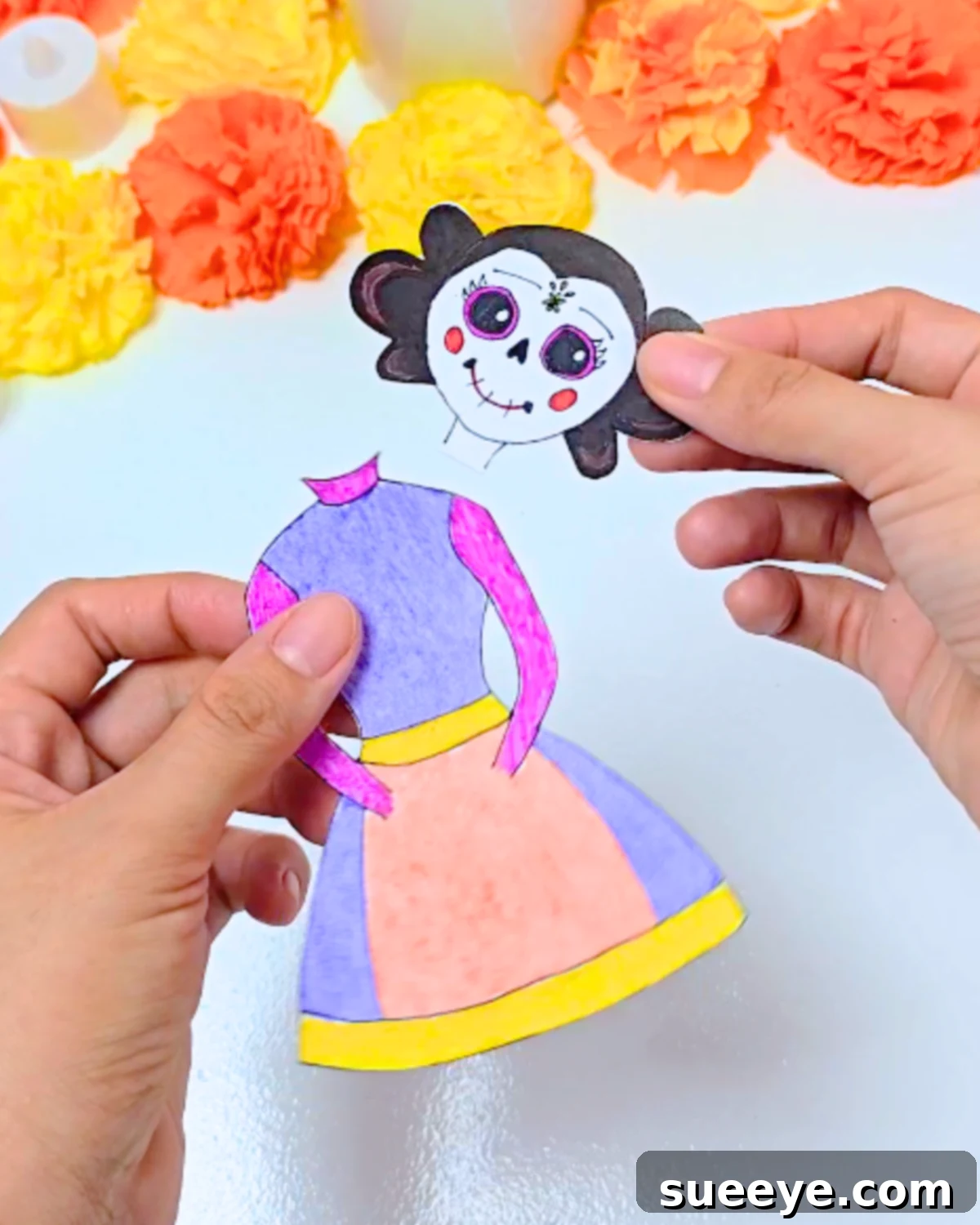 Craft a La Catrina from a Coca-Cola Bottle 6 Día de los Muertos Recycled Crafts - Drawing and coloring La Catrina's face and body