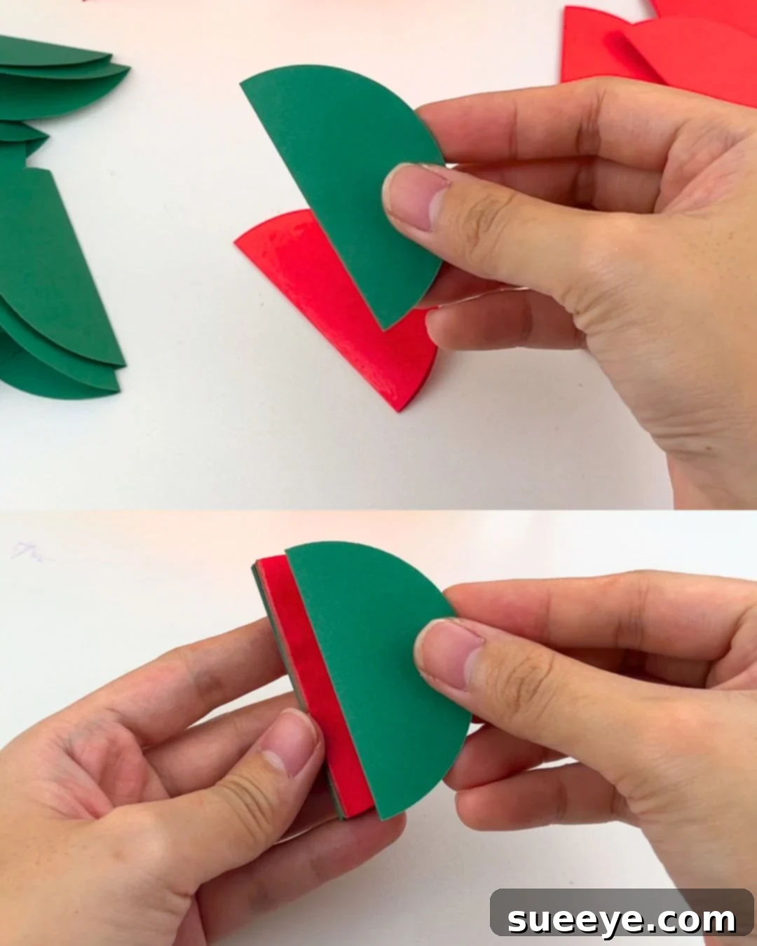 Make Easy Paper Christmas Ornaments 5 Inexpensive Christmas Crafts - Gluing two folded paper circles together.