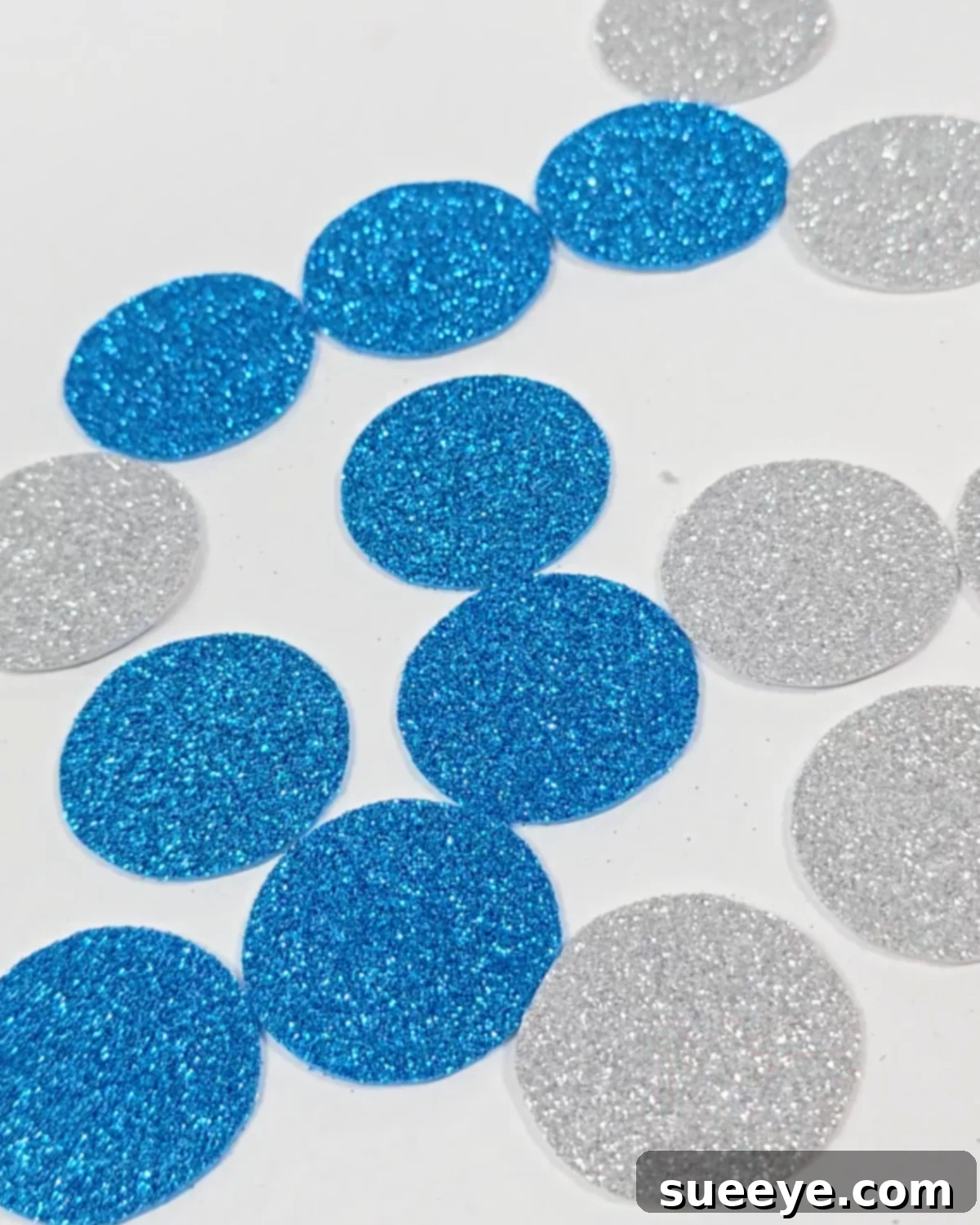Craft Dazzling Glitter Foam Christmas Ornaments 3 How to Make Glitter Foam Ornament: Cutting circles from blue and silver foam sheets