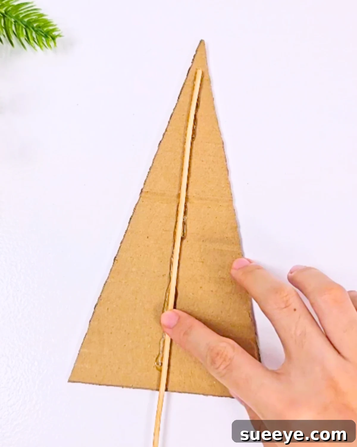 Whip Up a Charming Yarn Christmas Tree in Just 10 Minutes 3 Attaching Skewer for Yarn Christmas Tree