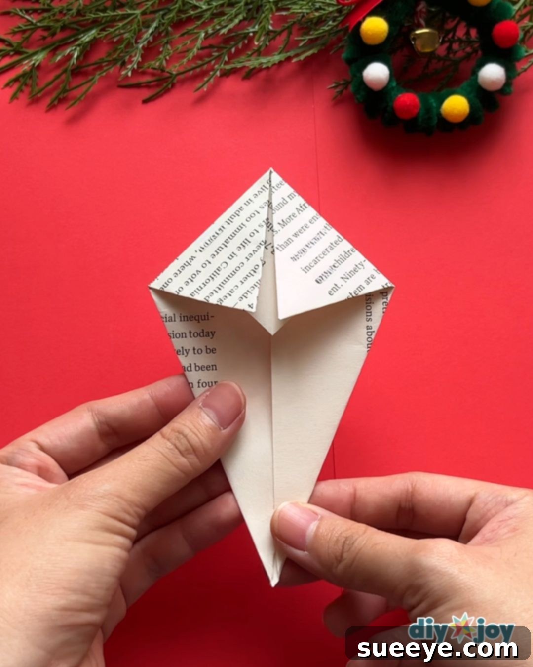 Homemade Christmas decorations step 3: folding top corners
