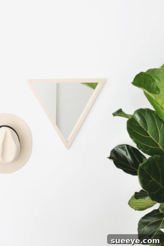 DIY Triangle Mirror - Modern Geometry DIY triangle mirror for a modern, geometric wall decor accent