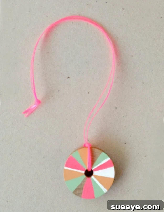 Pinwheel Necklace: A Whimsical & Wearable Craft DIY Pinwheel Necklace Craft for Kids - Wearable Paper Art - Fun Fashion Accessory