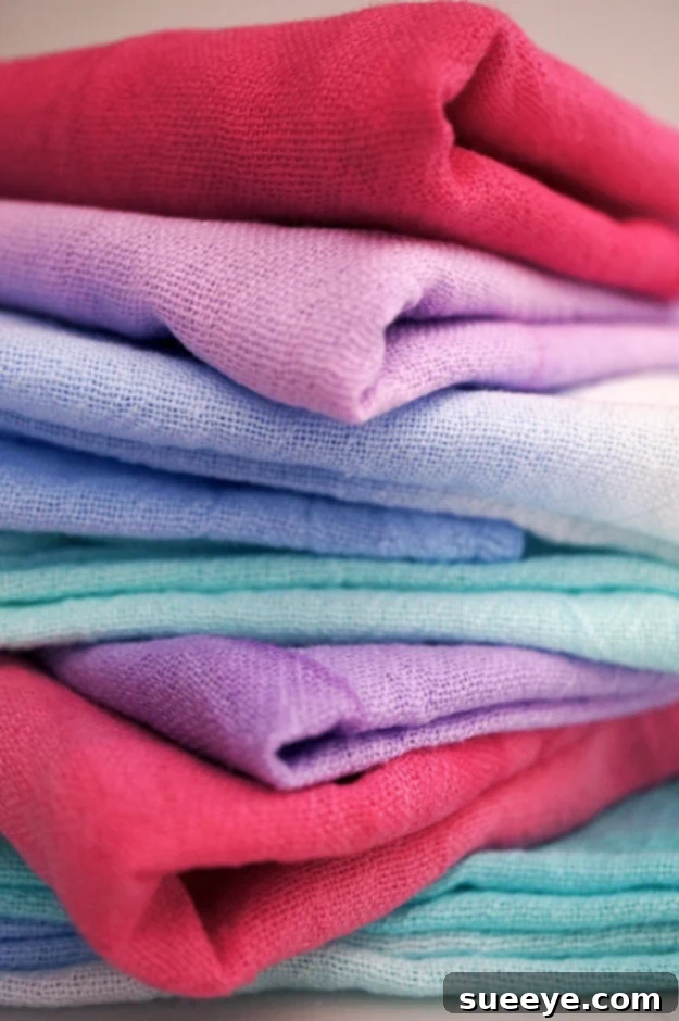 DIY Tie Dye Dish Towels Gift Fun and colorful DIY Tie Dye Dish Towels, a vibrant and practical handmade gift for friends or for brightening up any kitchen.
