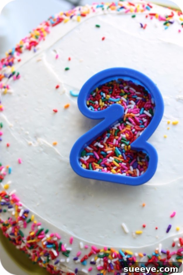Cake decorating using cookie cutters for designs