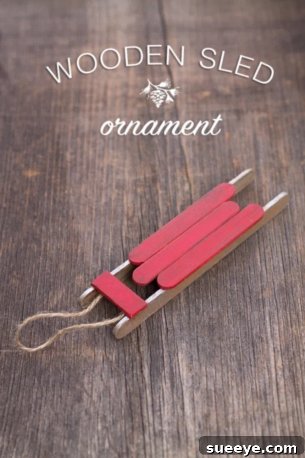Charming rustic wooden sled ornament for a classic holiday touch