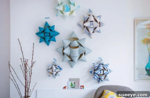 Large, decorative rosettes crafted from colorful wrapping paper, perfect as gift toppers or party decorations.