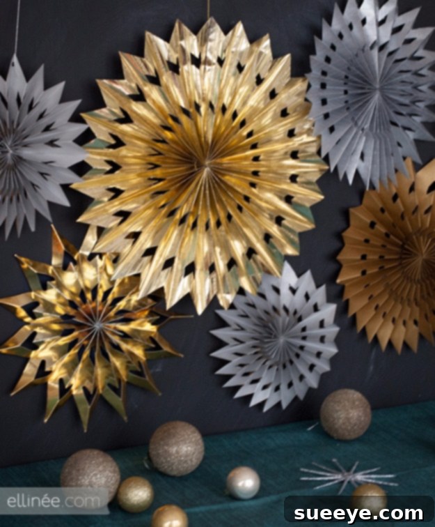 DIY Festive Paper Star Medallions from Leftover Wrapping Paper Decorative paper star medallions made from folded and cut wrapping paper, ideal for party backdrops or wall decor.