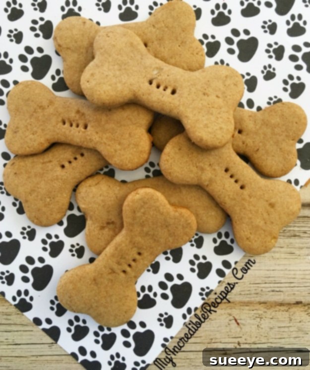 4 Ingredient Dog Biscuits - Healthy & Flea-Repelling Treat Homemade 4-ingredient dog biscuits shaped like bones, a healthy and easy pet treat recipe.