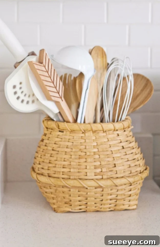 Flea Market Basket Utensil Holder Flea market basket used for kitchen utensil storage, adding rustic charm.
