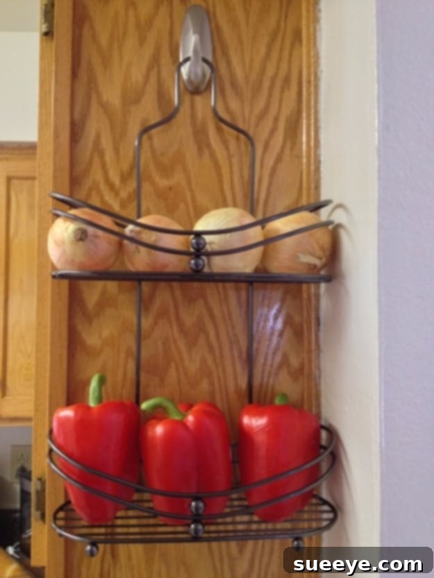 DIY Produce Storage Rack DIY wooden tiered produce rack for organized fruit and vegetable storage.