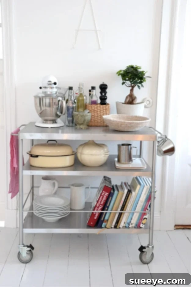 Stainless Steel Kitchen Cart Stainless steel kitchen cart providing additional workspace and storage.