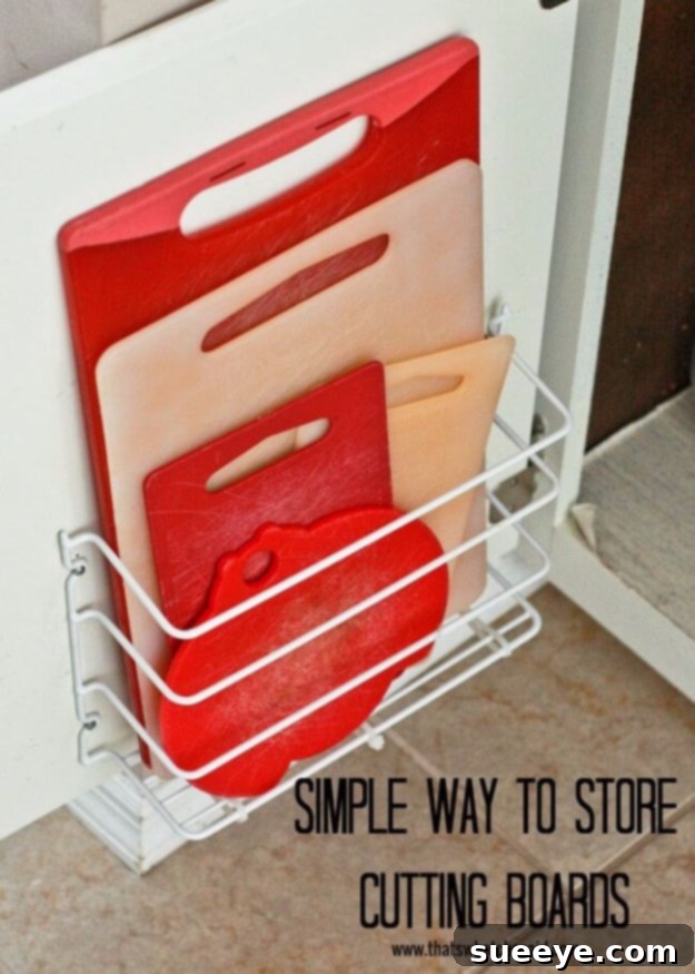 Cutting Board Storage Vertical storage solution for cutting boards inside a kitchen cabinet.