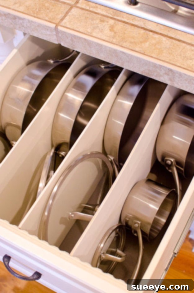 Deep Drawer Divider for Pots and Pans Deep kitchen drawer divided to neatly organize pots and pans.