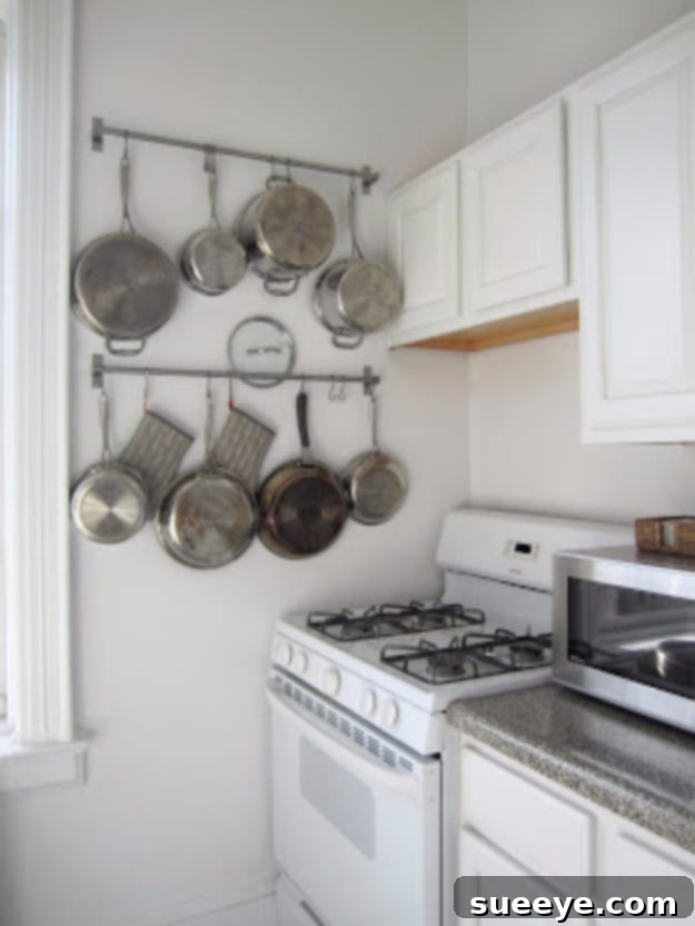 Pot and Pan Hanging Rails Nifty rails with S-hooks used to hang and organize pots and pans.