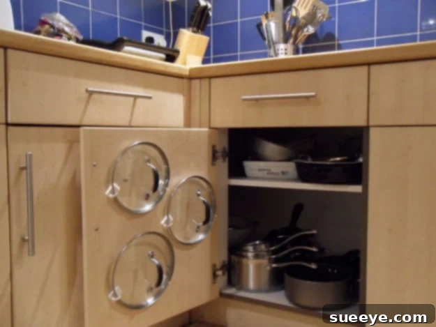 Easy Pan Lid Organizer Easy DIY cupboard pan lid organizer keeping lids upright and tidy.