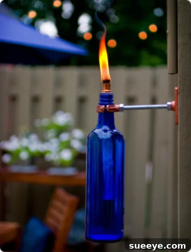 Recycled Wine Bottle Tiki Torch - Sustainable Decor Recycled wine bottle tiki torches for decorative backyard lighting and mosquito repellent